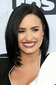 Lovato has rocked just about every hairstyle in the book from long blonde extensions to pink strands, but on may 27 they showed up to the iheart radio music awards rocking the most daring look to date. Demi Lovato Asymmetrical Cut Demi Lovato Hair Lookbook Stylebistro