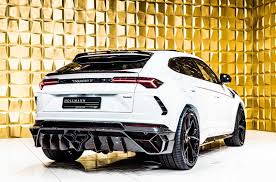 • full leather interior in the colour blue with accents in neon green. Formacar Check Out This 0 5m Lamborghini Urus By Mansory