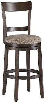 Be sure to have one or two there to enjoy a morning coffee and breakfast or a quick snack on an especially busy day. Drewing Bar Height Bar Stool Ashley Furniture Homestore