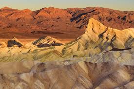 The soft colors of sunrises and sunsets can show you the many different moods of death valley. Zabriskie Point Sunrise Best Photo Spots
