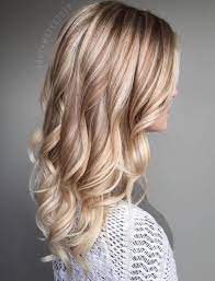 Long blonde grey hair with waves and a cool hair cut. 50 Types And Shades Of Blonde Hair Color For Stunning Look