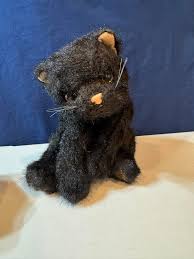 We have found a lost kitty. We are trying to find this kitty's mom. If you  know who it belongs to would you please tell them we are keeping it safe  until