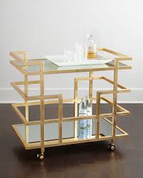 H deluxe gold metal oval mirrored bar cart crafted according to the highest standards crafted according to the highest standards from tempered glass and iron, this deluxe bar cart is the perfect accessory for entertaining. Azalea Bar Cart