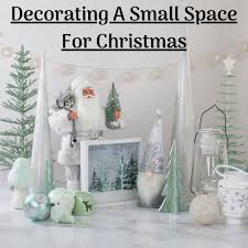 After you stock your bar cart, boho décor blogger, kimberly duran says, don't forget to decorate it with string lights, garland, and of course flashy gold tchotchkes. Decorating A Small Space For Christmas Christmas Central