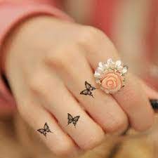 Butterfly Finger Tattoo Tattoos Finger Tattoos Tiny Butterfly Tattoo