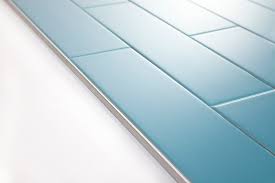 Beveled subway tile needs mitre cuts in corners. Using Schluter Trim Profiles With Subway Tile South Cypress Blog Simple Kitchen Remodel Subway Tile Inexpensive Kitchen Remodel