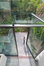 Plus Grande Porte En Verre Du Monde Par Sculp It Journal Du Design Grandes Portes Architecture Conceptuelle Grandes Fenetres