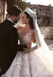 Explore stunning and affordable wedding dresses 2020 new styles at miagal.com, we carry the latest trends in wedding dresses to show off that fun and flirty style of yours. Elie Saab 2020 Ball Gown Long Sleeevs Wedding Dresses Luxury Crystal Beaded 3d Flowers Lace Plus Size Saudi Arabic Dubai Bridal Gown Red And White Wedding Dresses Sheath Wedding Dresses From One