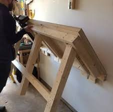 Fold Up Workbench For My Small Garage Shop In 2020 Garage Workshop Layout Workbench Plans Diy Small Garage