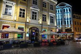 Līga) is the second tier of football in latvia and is organised by the latvian football federation.the league is also known as the komanda.lv first league (komanda.lv 1. Photo Latvia Riga Cafe Street Night Time Houses Cities