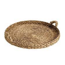 With its crisp architectural details and long slender shape, our rocco tray is designed to go wherever your life takes it. Round Braided Natural Seagrass Tray