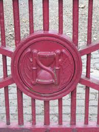 An hourglass provided with the bat wings symbolize the time flying by; Symbol Of The Month The Hourglass Shadows Fly Away