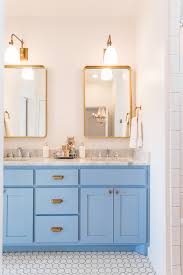 Since 2009, we have been family owned and operated and it shows in the countless referrals we receive daily. Bright Hydrangea Blue Bathroom Vanity With Brass Lighting And Brass Mirrors Real Estate Stalking At Carlton Landing Homes Built By Scissortail Modern Farmhouse Design Www Pencilshavingsstudio Com Pencil Shavings Studiopencil