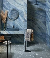 When i discuss with clients their bathroom tile options, i'm often asked the difference between porcelain tile and marble. Marble Luxe Porcelain Palissandro Blue Large Affordable Marble Effect Tiles Ca Pietra