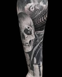 Tattoo artist Chris Adamek USA