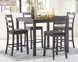 An unconventional choice that is gaining popularity, counter height dining room sets make mealtime fun and relaxed. Bridson Counter Height Dining Table And Bar Stools Set Of 5 Furniture Den