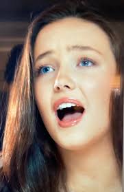 Lucy Thomas's Unique Singing Voice and Talent