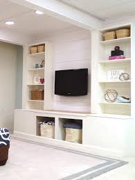 Diy Built In Media Wall Unit With Extra Storage From An Ikea Bookcase Remodelaholic Media Wall Unit Ikea Wall Units Wall Unit