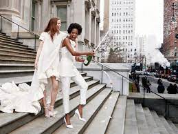 Short and chic silky chiffon dress with textural embroidery. 25 Chic Courthouse Wedding Dresses To Make It Official