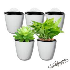 Adding a handful of small rocks, sand or charcoal to the bottom of your planter is an easy way to give that excess water somewhere to go and prevent your plants from drowning. Patio Lawn Garden Gardening Pots Planters Container Accessories Mkono Hanging Planter 3 Tier Macrame Plant Hanger 5 Inches Galvanized Flower Pots Metal Bucket With Cotton Rope For Home Garden Planting