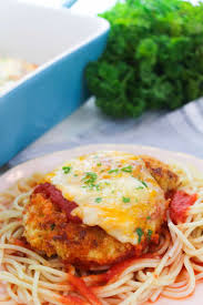 Baked chicken parmesan that's tender and juicy inside and crispy on the outside. Classic Chicken Parmesan Recipe