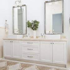 Metal bathroom hardware will provide the glow in the theme. White And Beige Bathroom Concept Design Ideas