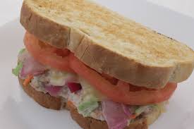 When the sandwich is unwrapped in person, however, things look a bit. Tuna Melt Sandwich Homemade Tuna Salad With Melted Swiss Tomatoes And Roasted Red Onions On Sourdough Bread Tuna Melt Sandwich Sandwiches Wrap Sandwiches