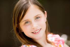 Girl, wind, eyes, closed, freckles, blonde by Candice Cason. Photo stock