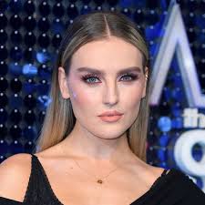 Perrie edwards reaches out to fans after being rushed to hospital before little mix gig. Perrie Edwards Just Unveiled A Stunning Feathered Fringe
