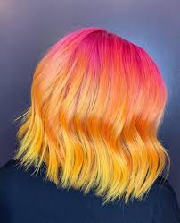Vivid hair design and spa is the sanctuary that allows you to feel good about taking a few minutes to be your best self. Pink To Yellow Vivid Hair Ombre Orange Ombre Hair Creative Hair Color Sunset Hair