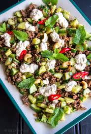 This easy recipe serves a family of four and is ready in less than an hour. Spicy Beef Cucumber Salad With Cashew Raita Paleo Gluten Free