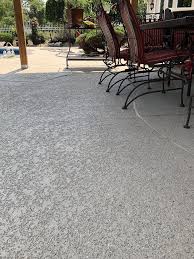 Extend the look and feel of your interior hardwood floors outside with a wood plank overlay so your patio looks like a real wood deck, or dramatically change the space. Pool Deck Ideas St Louis Mo Decorative Concrete Resurfacing Pool Decks Concrete Deck Cool Decking