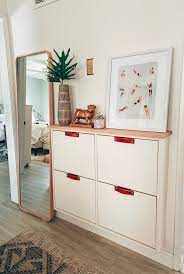 Ikea is famous for simple and timeless units that are looking forward to hacking, and today we'd like to share the coolest ikea kura bed hacks. Stall Ikea Hack Small Space Solution In Our Living Room The Blushing Bungalow Ikea Living Room Ikea Shoe Cabinet Small Space Living Room