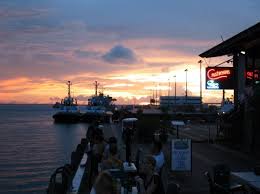 There is no shade to cover the black pearl, so make sure to put some sunscreen on before head off to this pirate ship. Sunset At Stokes Hill Wharf Darwin Photo