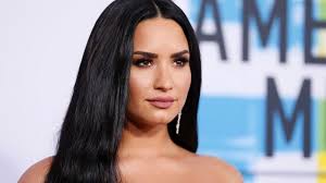 Demi Lovato promises to tell her 'side of the story' with first album since  overdose
