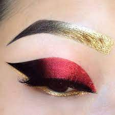 Incorporate these metallic tones through eyeshadow, lip color, and blush. Red Gold Makeup Look On We Heart It