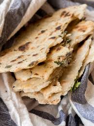 Naan is definitely the most popular bread in indian restaurants. Garlic Naan Recipe Simple Flaky Indian Flatbread