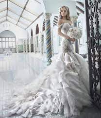 In love with all of the special detailing and extras that adorn pnina tornai gowns, jackie was instantly attracted to a mermaid gown with a dramatic tulle flare out. Pin On Wedding Gowns
