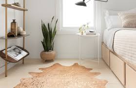 If you want to add a big statement to a room, just put down a large zebra print rug. Cowhide Rugs For Every Place In Your Home Rugs You Ll Love Lonny