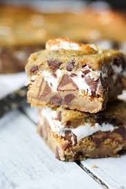 Chocolate Chip Cookie S Mores Bars Are Layers Of Cookies Marshmallow Peanut Butter Chocolate Chips An Grah Desserts Fun Desserts Peanut Butter Chocolate Chip