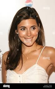 Actress Jamie Lynn Sigler arrives for the opening night of the new  home-style barbeque restaurant "Southern Hospitality" in New York City