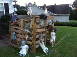 You'll need to buy heaviest bamboo fence rolls and follow the directions they show here. Zombie Doll Playhouse Made Out Of Pallets I Know A Boy That Would Love Halloween Outdoor Decorations Halloween Diy Outdoor Halloween Decorations Diy Outdoor