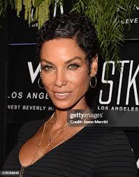 Eric Meier and Brittny Gastineau attend the W Los Angeles