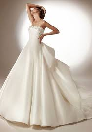 To create such a dramatic look, many ball gown wedding dresses use layers of tulle or crinolines, a type of stiff underskirt. Strapless Wedding Dresses The Knot
