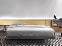 Nello stesso spazio occupato dal letto trova posto una soluzione d'arredo il letto con contenitore giusto per il tuo spazio. Letto In Legno Con Gambe Letto Effetto Sospeso Sangiacomo A Prezzo Ribassato