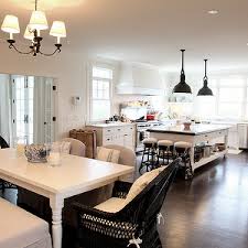 Angie Gren Interiors Dining Rooms Black Wicker Captain Dining Chairs Natural Linen Transitional Dining Room Farmhouse Dining Table Wicker Dining Chairs