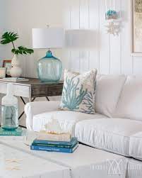 These designs typically include colors that resemble turquoise waters and white sand, but the beach house interior design ideas in your home can include seashells, surfboards, and other accessories that make you think of the seashore. 26 Small Cozy Beach Cottage Style Living Room Interior Design Decor Ideas Coastal Decor Ideas Interior Design Diy Shopping