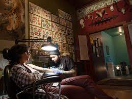 Deluxe tattoo is one of the most versatile tattoo studios. Revolution Tattoo Shopping In Bucktown Chicago