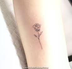 This rose design is a nice pattern for such a kind of tattoo print and has a beautiful outline of petals and leaves with a black background to emboss the rose tattoo design on the skin. Terrific Ma Supply D Inspiration Pinterest Larevuedekathl Dinspiration Larevuede Small Rose Tattoo Rose Tattoo Forearm Tiny Rose Tattoos