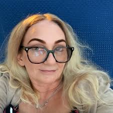 What could be causing sudden sneezing fits in a 10.5-year-old female Yorkie?